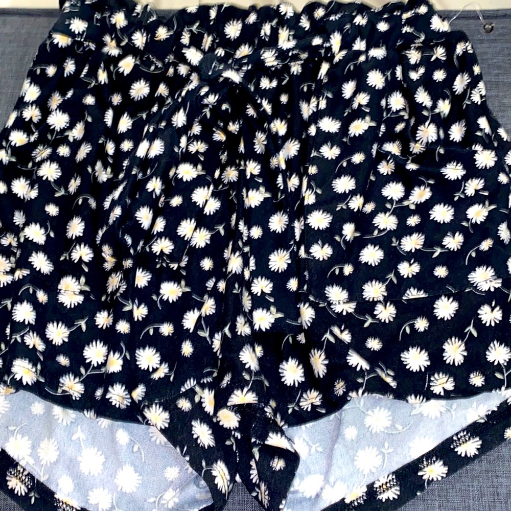 Black shorts with flower design. Flowy shorts